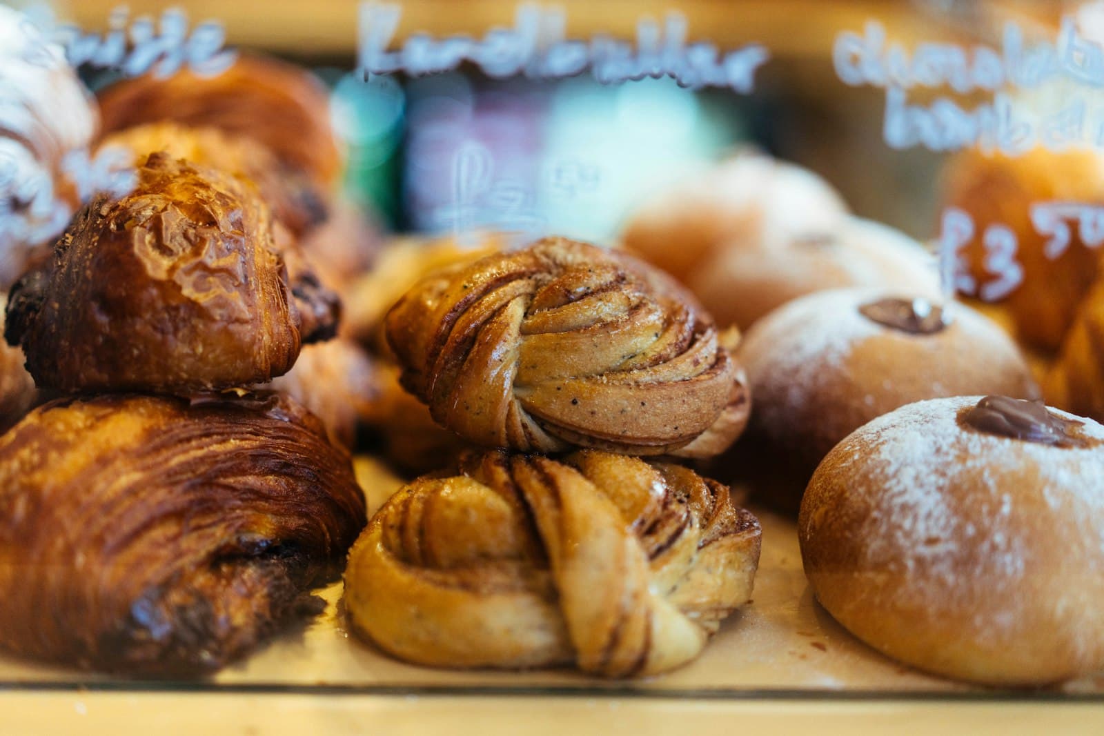 Cinnamon buns and pastries in a bakery window